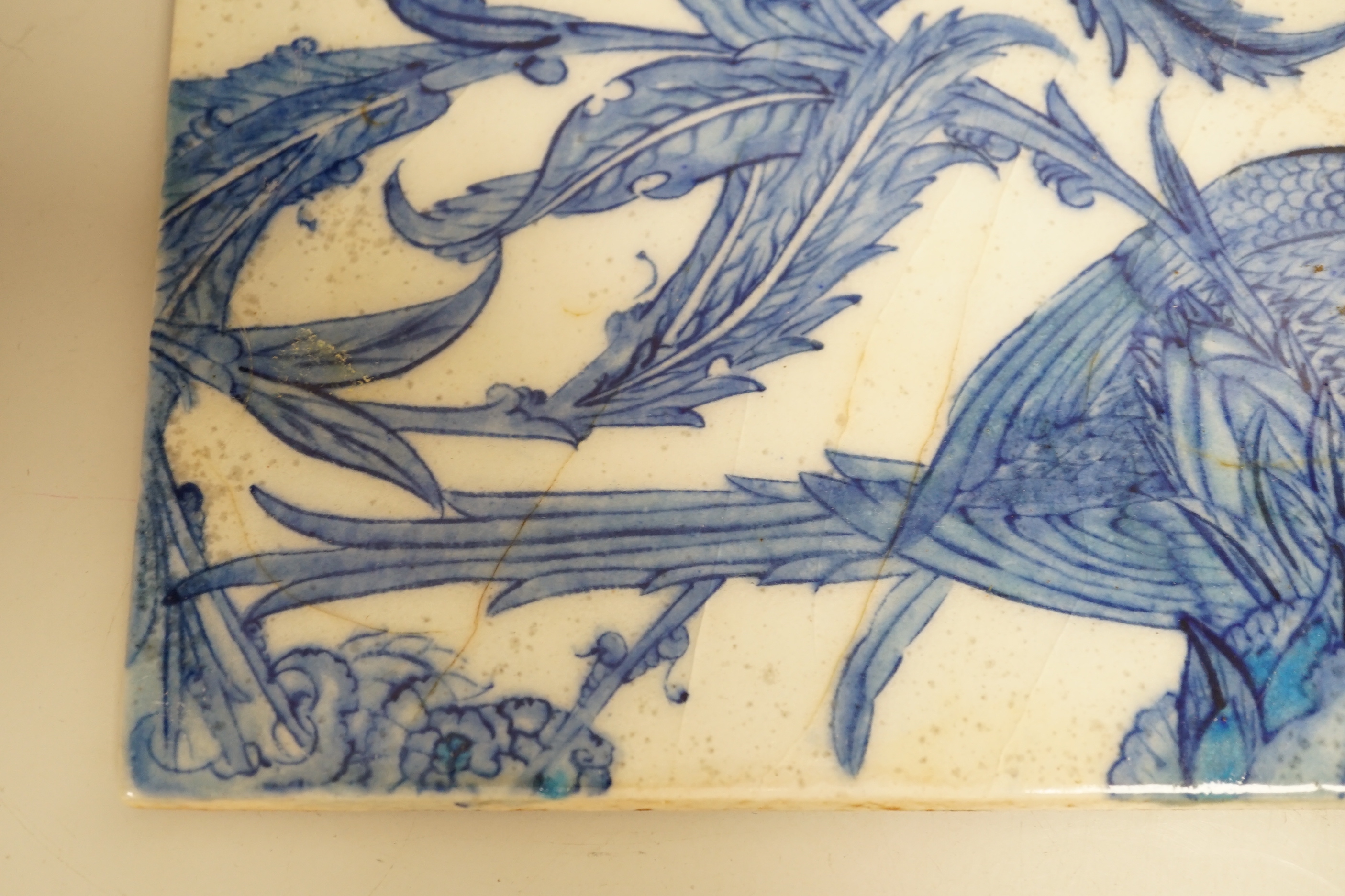 Two Turkish Iznik blue and white tiles, 24cm x 16.4cm